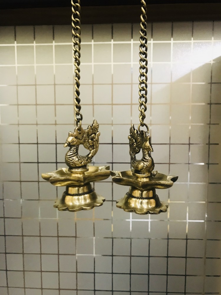 Brass Peacock Carved Hanging Diya Set
